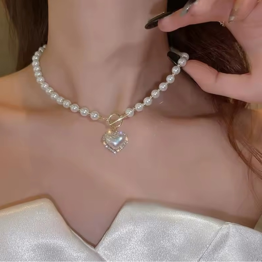 Elegant Pearl Necklace with Heart Pendant